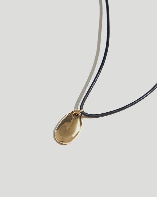 Small Pebble Pendant Necklace Gold Cord